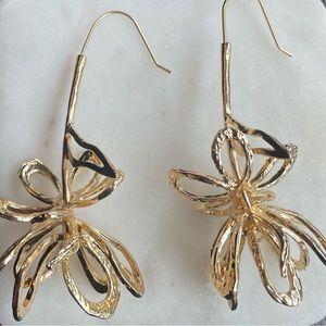 Gold tone floral drop earrings